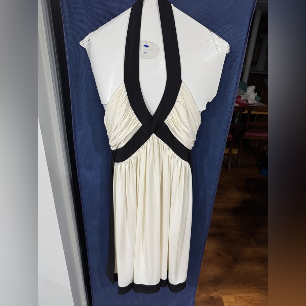 Maggie London white (ivory) and black above-knee halter dress, size 6 petite.